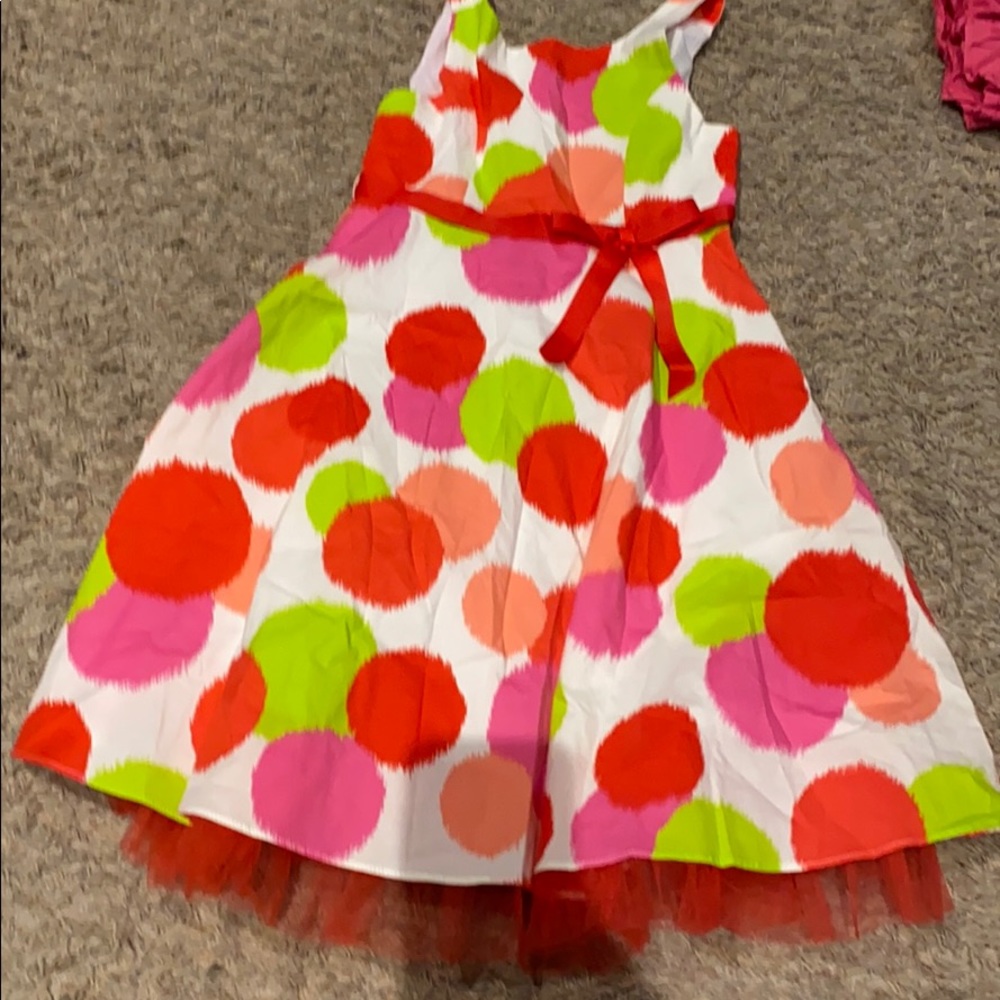 Polka dot bright colored dress with can can